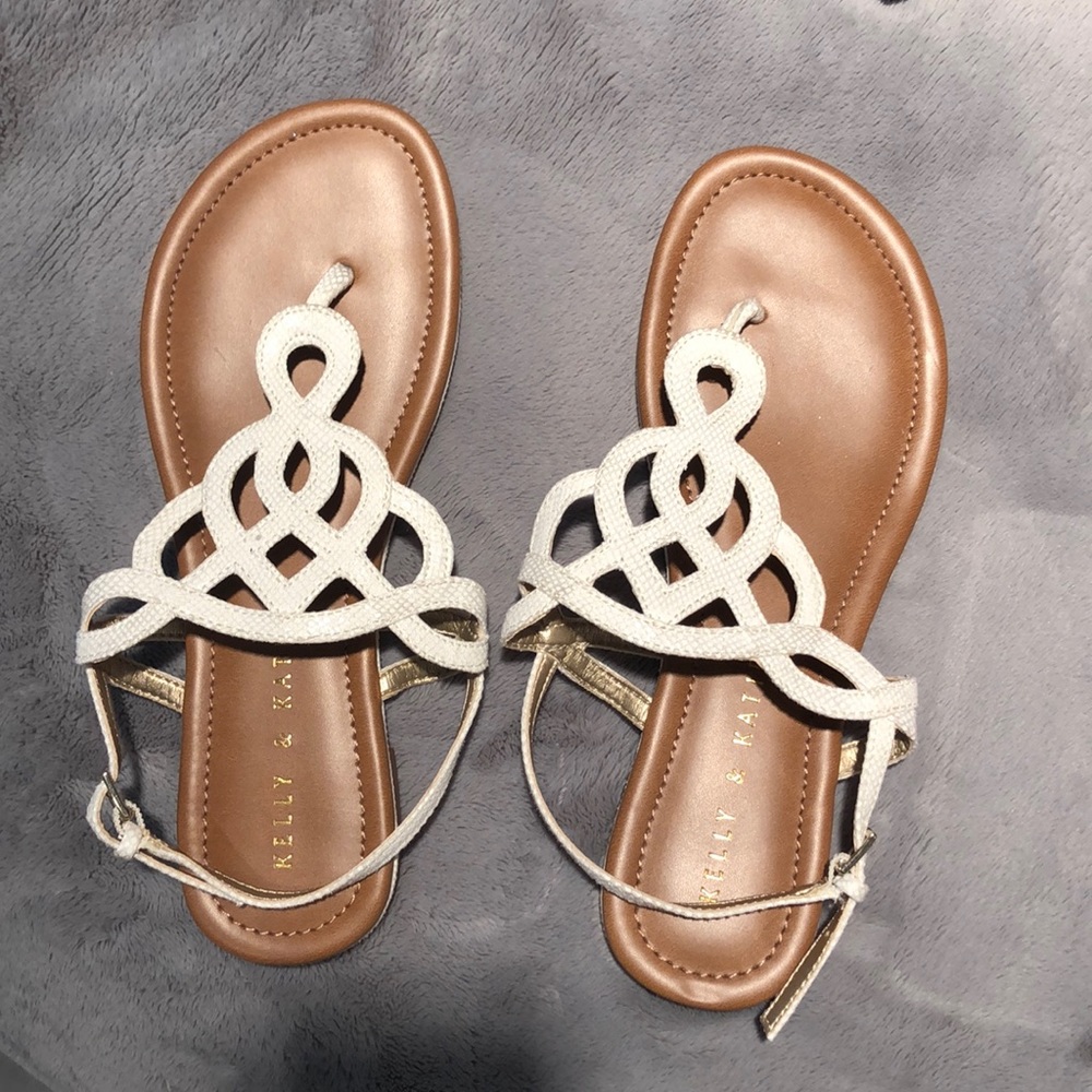 tan and white sandals